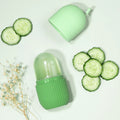 Green skincare product with cucumber slices on a light background